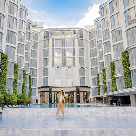 The Salil Hotel Riverside Bangkok Bagian luar foto The hotel's courtyard