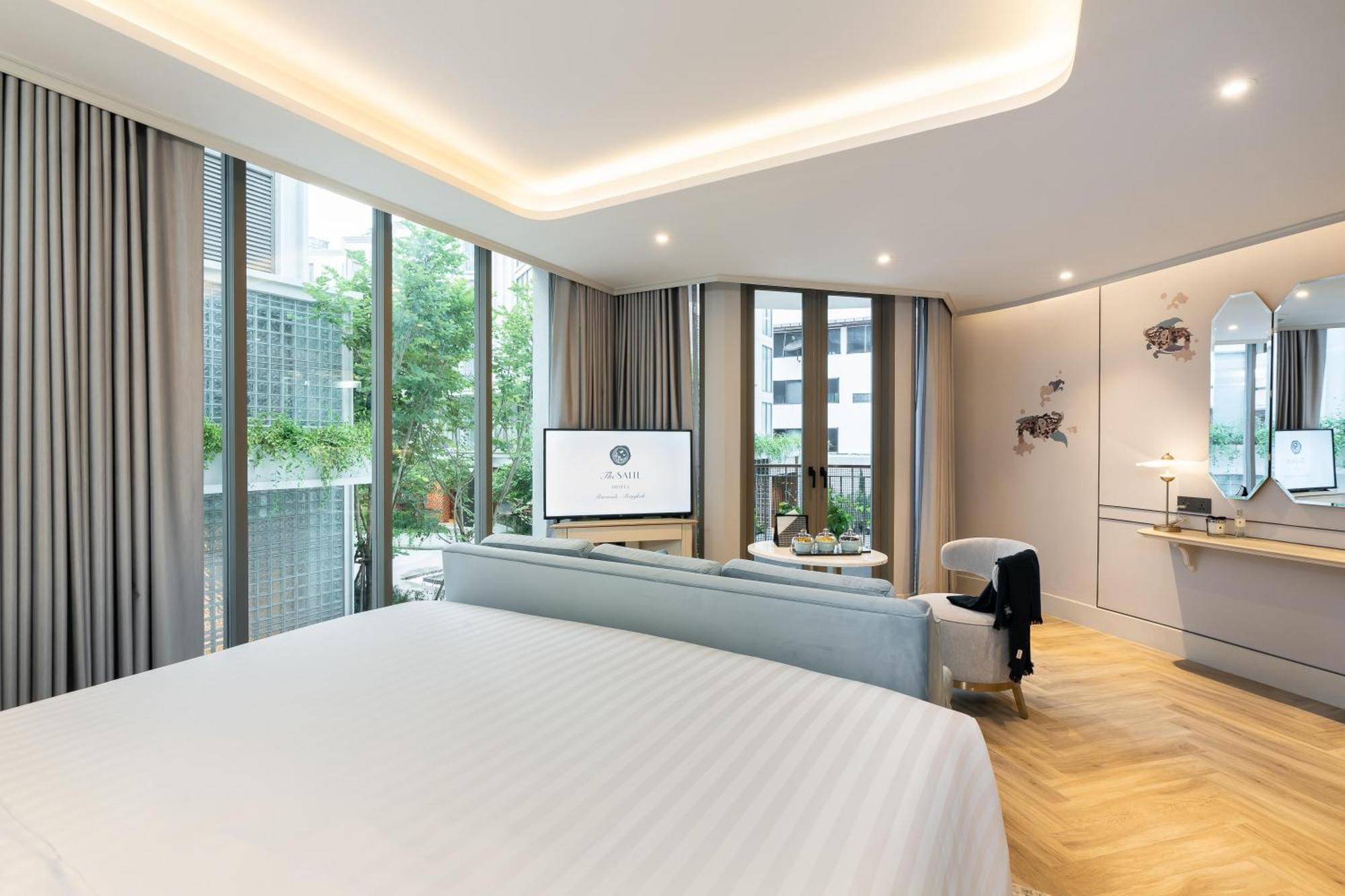 The Salil Hotel Riverside Bangkok Bagian luar foto Deluxe Room