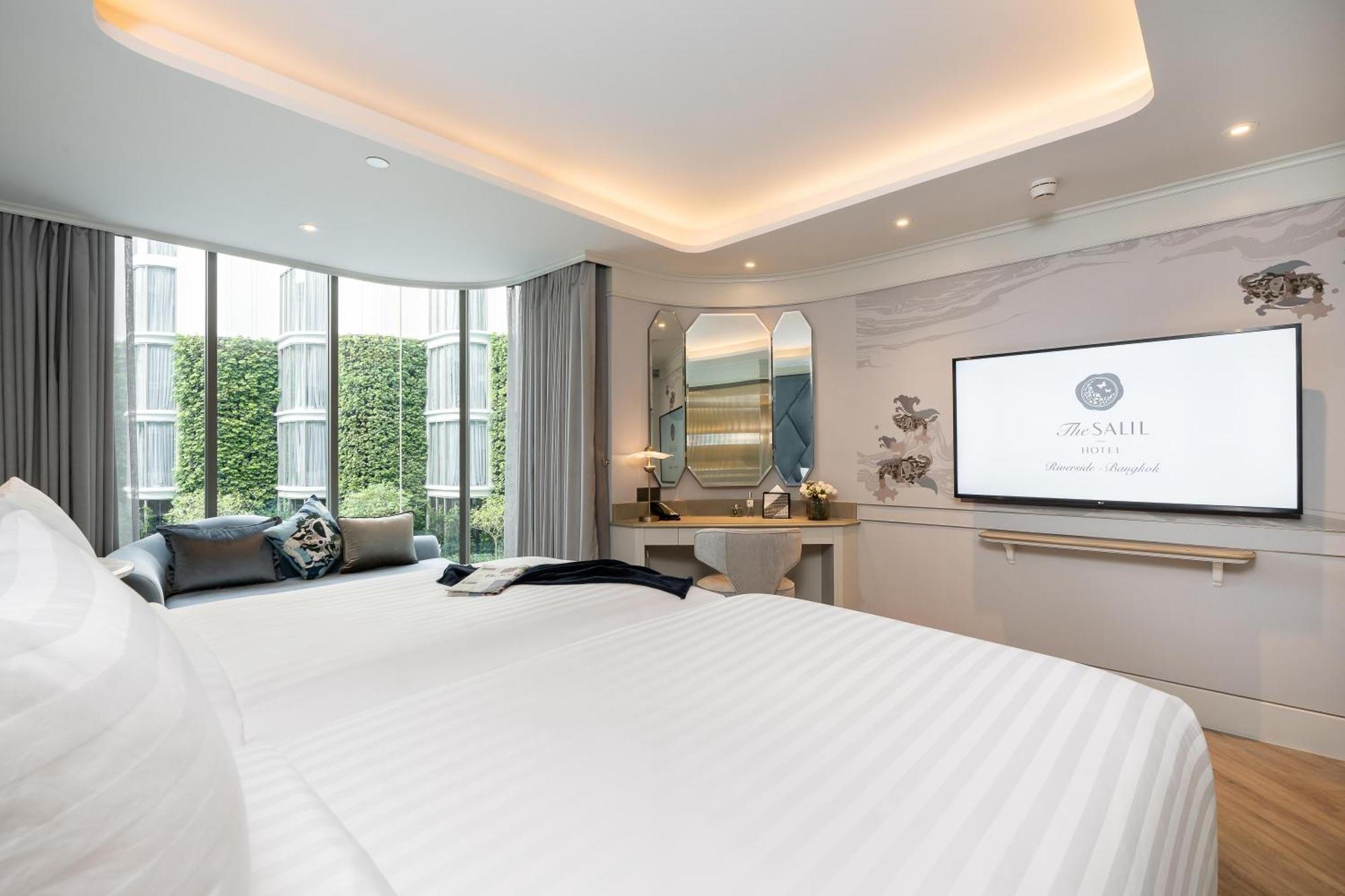 The Salil Hotel Riverside Bangkok Bagian luar foto